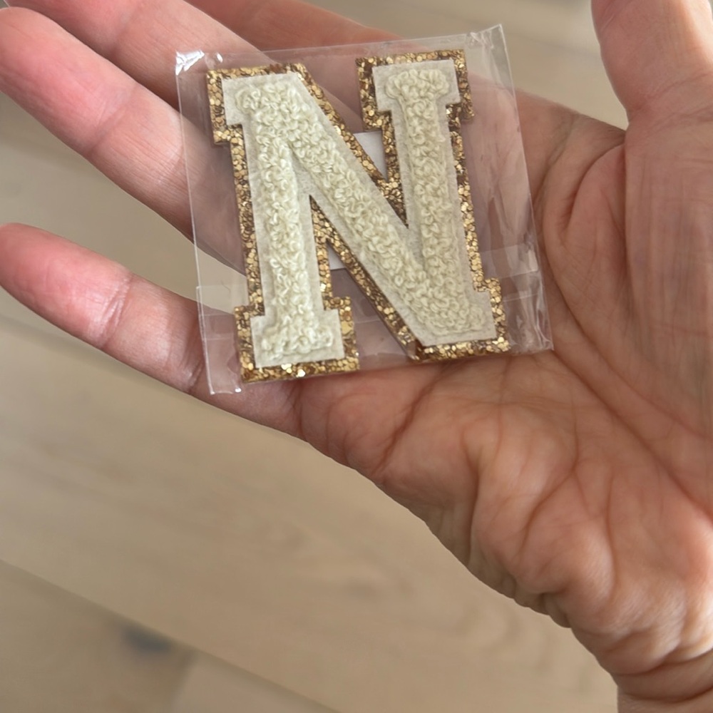 Stoney clover lane varsity letter N